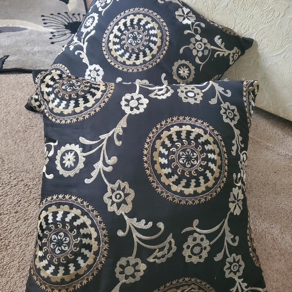 2 black tan throw pillows 16" sq